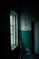 window with bars in a dark place