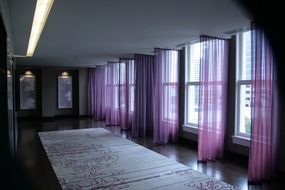 the mysterious room with transparent purple curtains