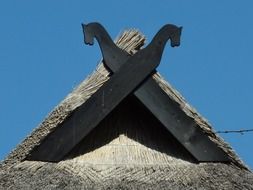 gable roof with horses