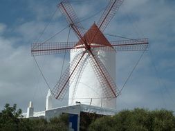 white windmill is located in Spain