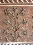 floral ornament on the walls of taj mahal