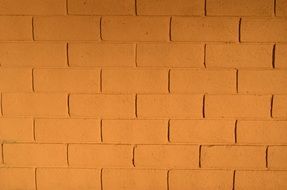 yellow cement brick wall