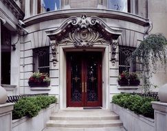 beautiful flowers decorated old style doorway, usa, new york city