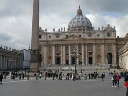 people on square at saint peterâs basilica, italy, rome, vatican