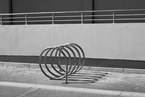 metal circles on the street for parking bicycles