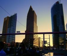 Office buildings at colorful sky background in the city