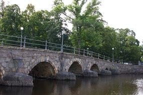 stone bridge over river in sweden