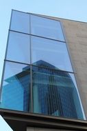 reflection of a modern building in the business district in frankfurt