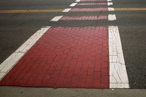 red crosswalk across the road close-up