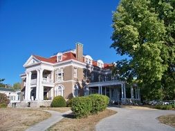 rockcliff mansion near a green tree