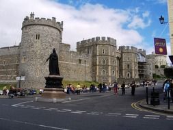 Tourists walk along Windsor Castle