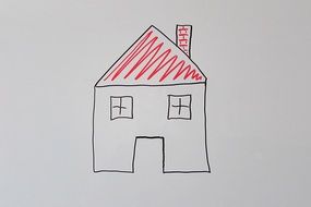 house as a black, red and white child's drawing