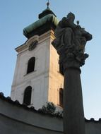 statue on the background of the church in the Czech Republic