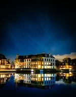 night city reflected in the waters of the lake