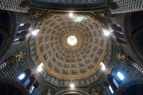 Dome decorated with gold stars and lights