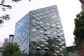 modern building with glass facade in tokyo