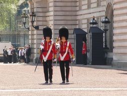 changing of the guard at Buckingham Palace in London