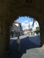 city arch with plants on top