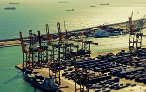 cranes and containers in the port of Barcelona