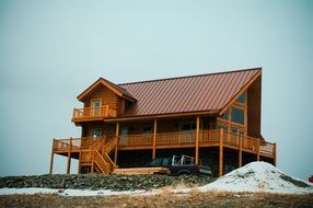 wooden house on the hill in winter, Montana