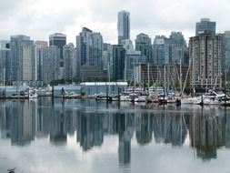 skyscrapers of Vancouver and their reflections in the water, British Columbia