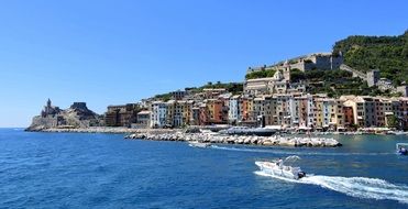 the sailing boat on a background of the landscape Porto Venere, Liguria region, Italy