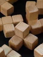 wooden blocks for the game on a black background