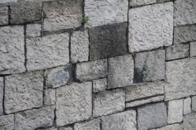 abstract patterns of grey stone wall