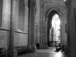 arched interior of a church in portugal in black-white