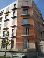 corner house with wood cladding