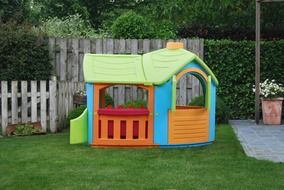 plastic playhouse on the yard