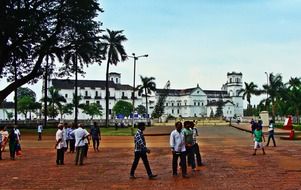 people near the church in Goa, India