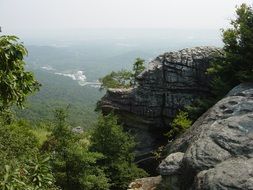 observation deck over a cliff in the forest