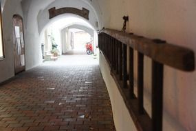 wooden ladder tunnel with paving stones