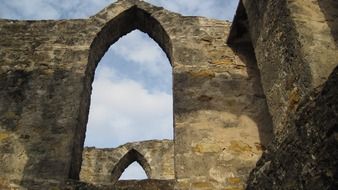 ancient arch with green moss