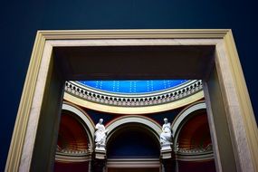 the interior of the museum is visible through the door
