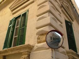 view of valletta street through the mirror