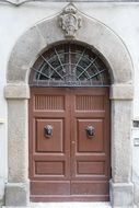 Front door with stone arch