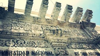 carving on the facade of a Gothic building in Peru