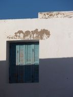 blue window and white wall