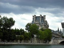 old building on the banks of the Seine river in Paris