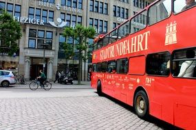 a two-story red bus in Hamburg