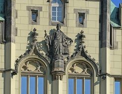 close-up facade of the building with a sculpture on the market of the old town in Wroclaw