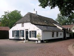 white old house in a small town