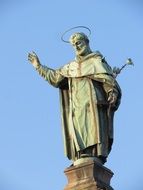 Religious sculpture against the backdrop of clear sky, italy