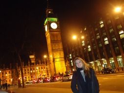 Girl in the background of night London