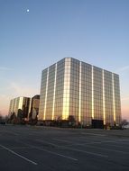 Reflection of sun on the building at morning time