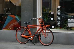 extraordinarily beautiful orange bicycle in amsterdam