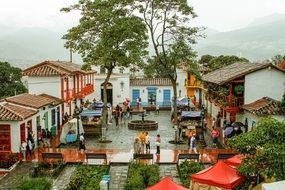 people near historic buildings