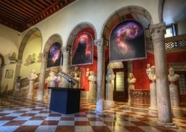 sculptures and paintings in the museum